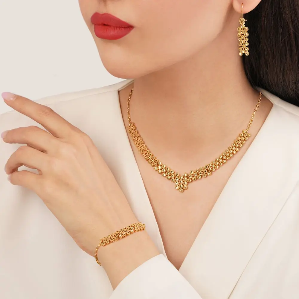 تصویر سرویس برنجی تراشدار طلایی